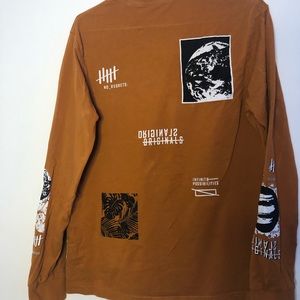 yellow long-sleeve graphic tee🤎